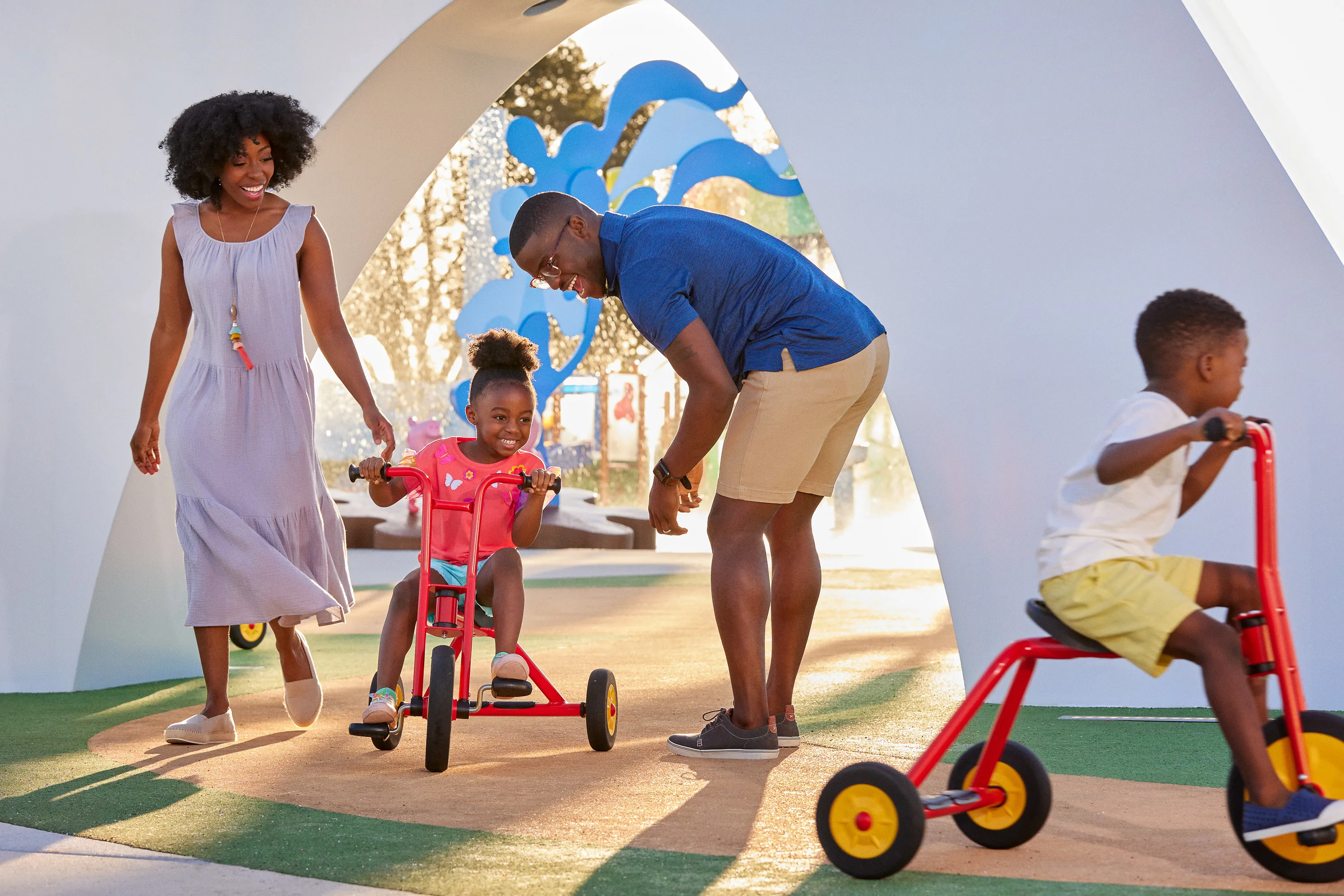 A family rides bikes at Peppa's Pedal Bike Tour 